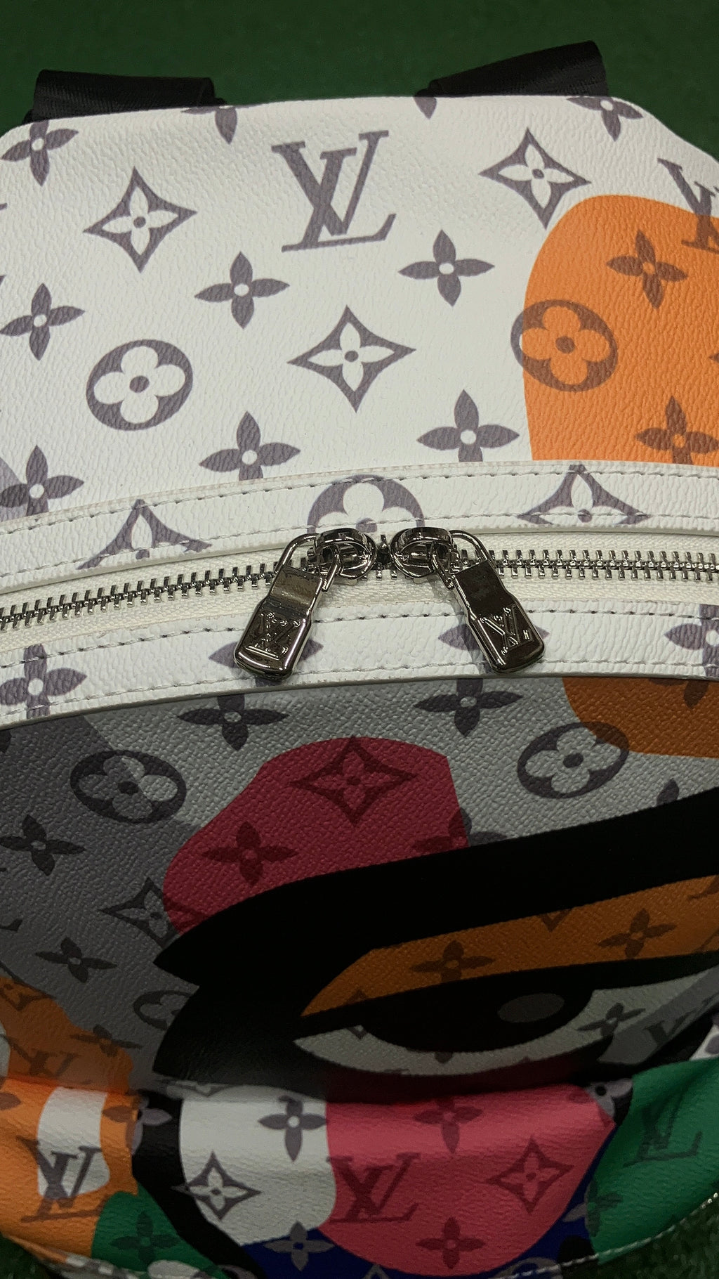 LV Multicolor Discovery PM Backpack