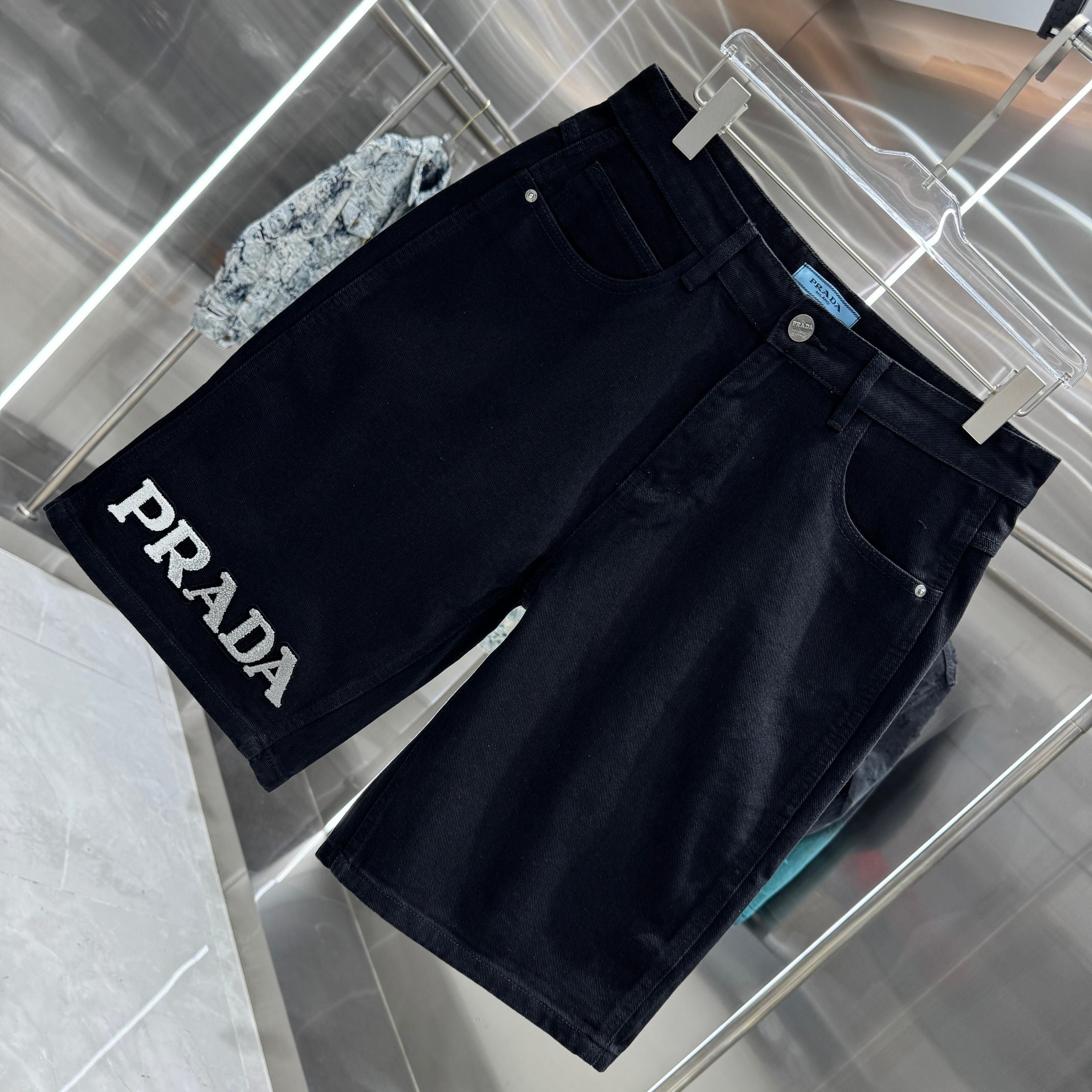 Prada Letter Flocked Denim Shorts