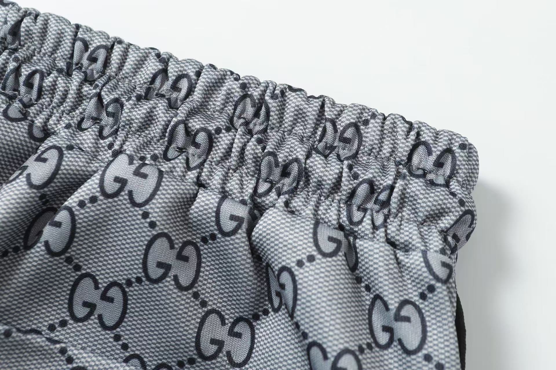 GG Monogram Patterned Trousers