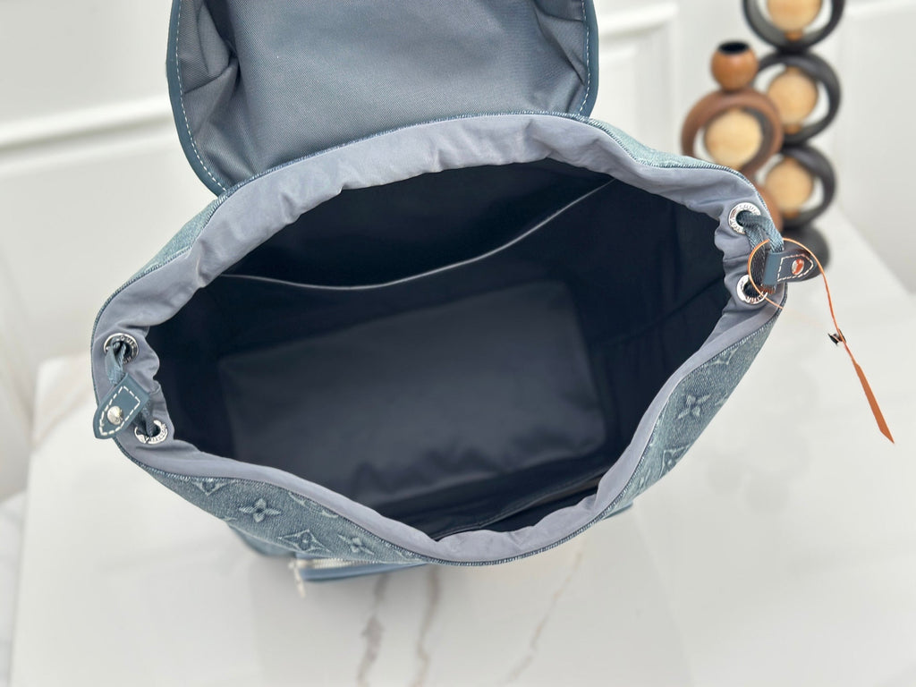 LV Embossed Denim Backpack