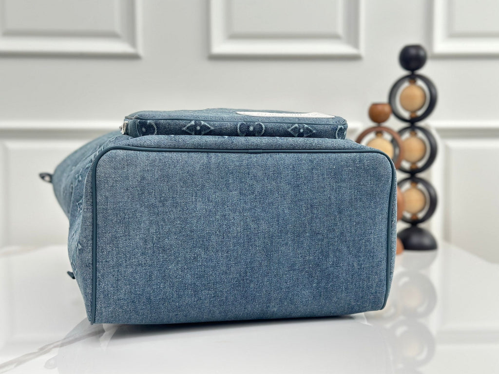 LV Embossed Denim Backpack