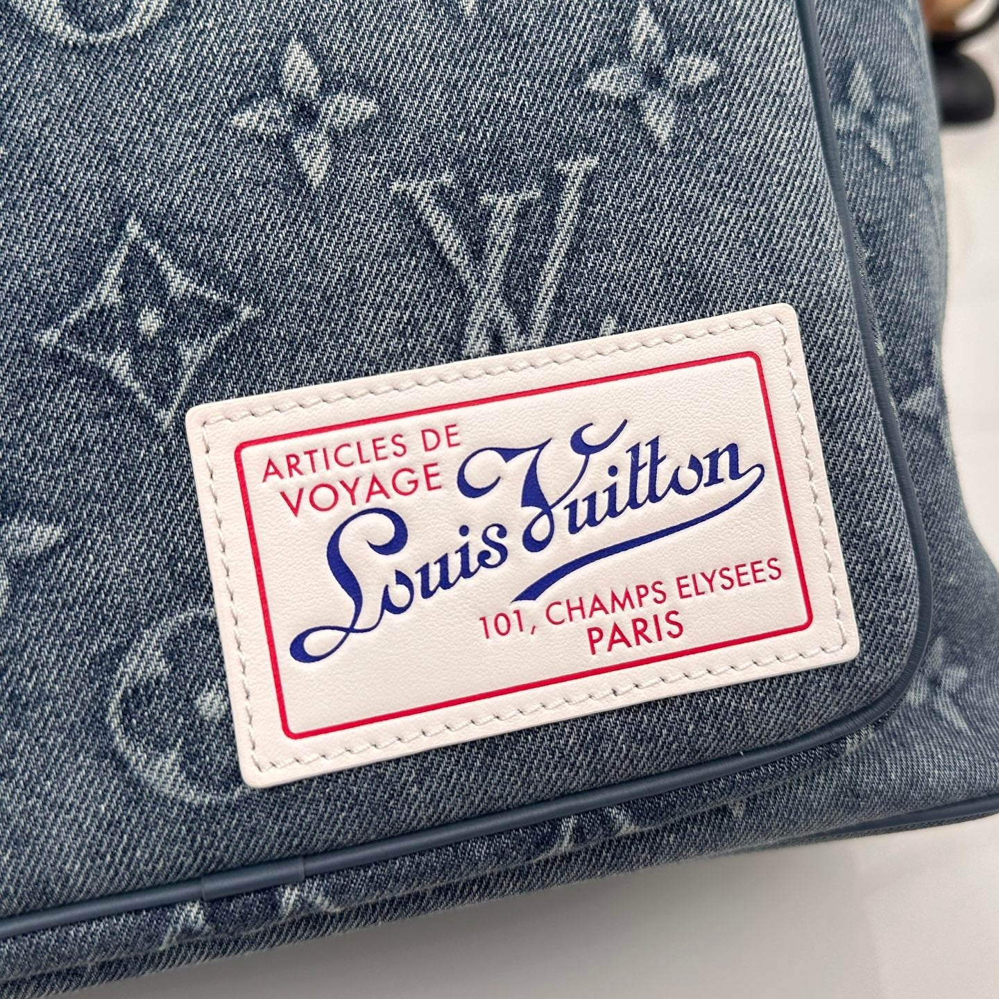 LV Embossed Denim Backpack