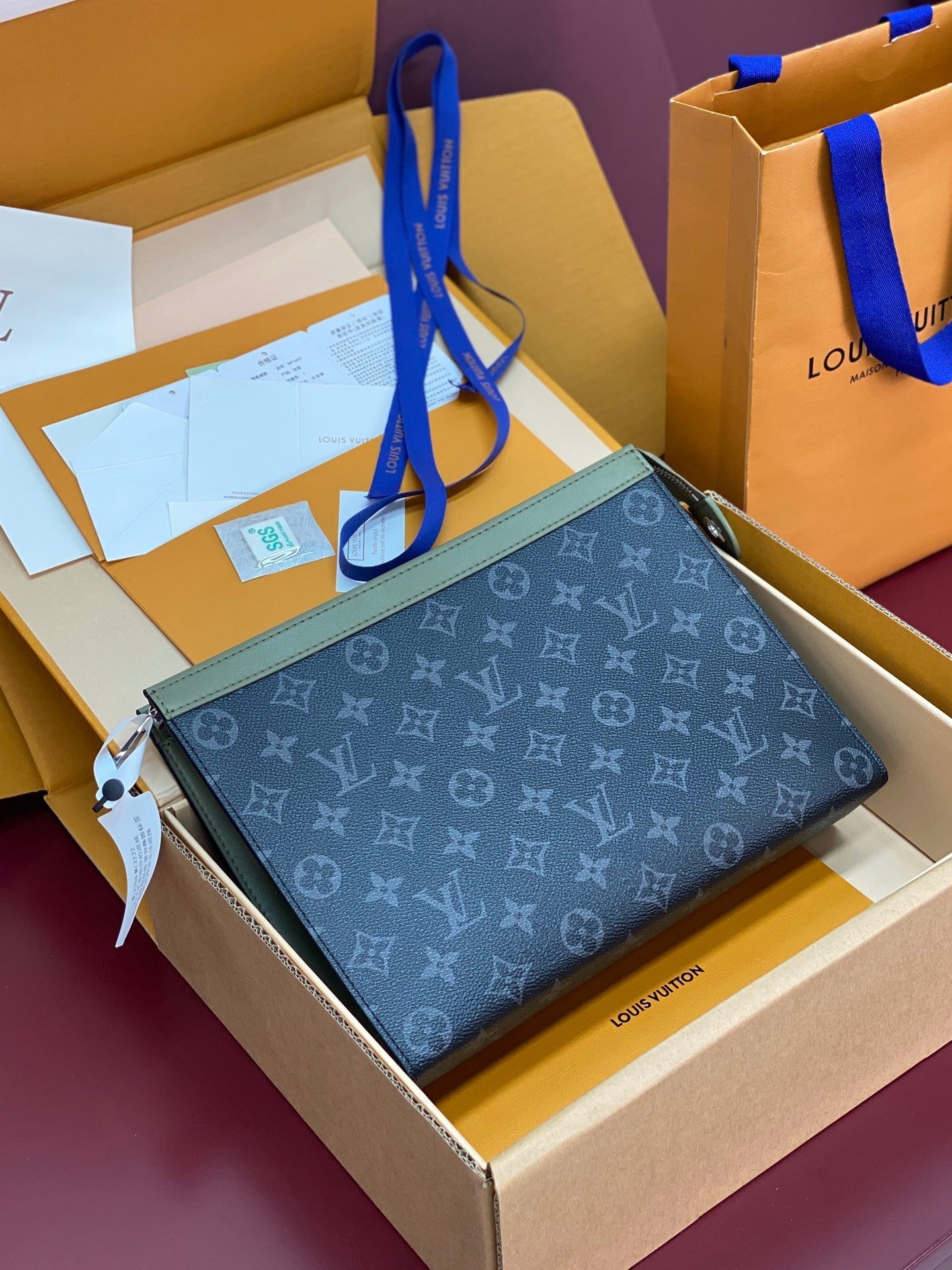 LV Pochette Voyage Clutch